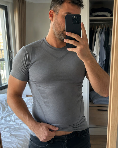 DEFYNMEN compression undershirt worn in an everyday setting