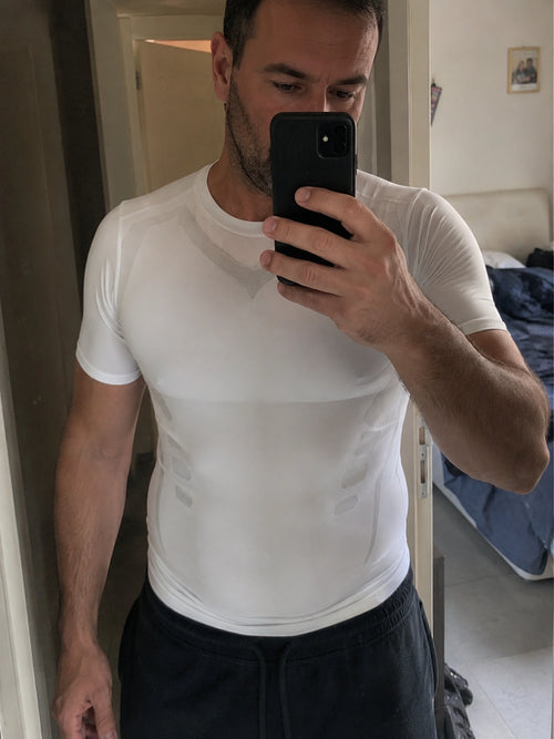 DEFYNMEN compression undershirt worn in an everyday setting