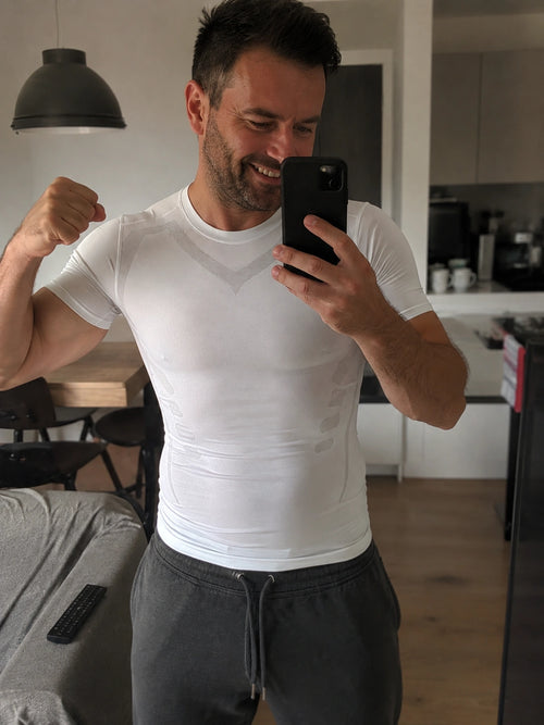 DEFYNMEN compression undershirt worn in an everyday setting
