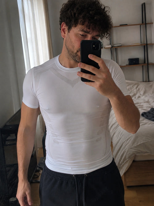 DEFYNMEN compression undershirt worn in an everyday setting