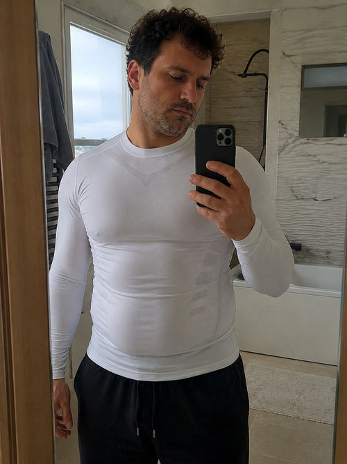DEFYNMEN compression undershirt worn in an everyday setting