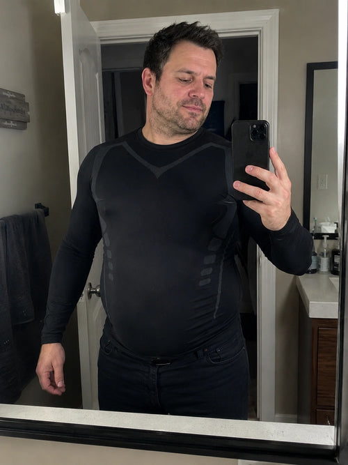 DEFYNMEN compression undershirt worn in an everyday setting
